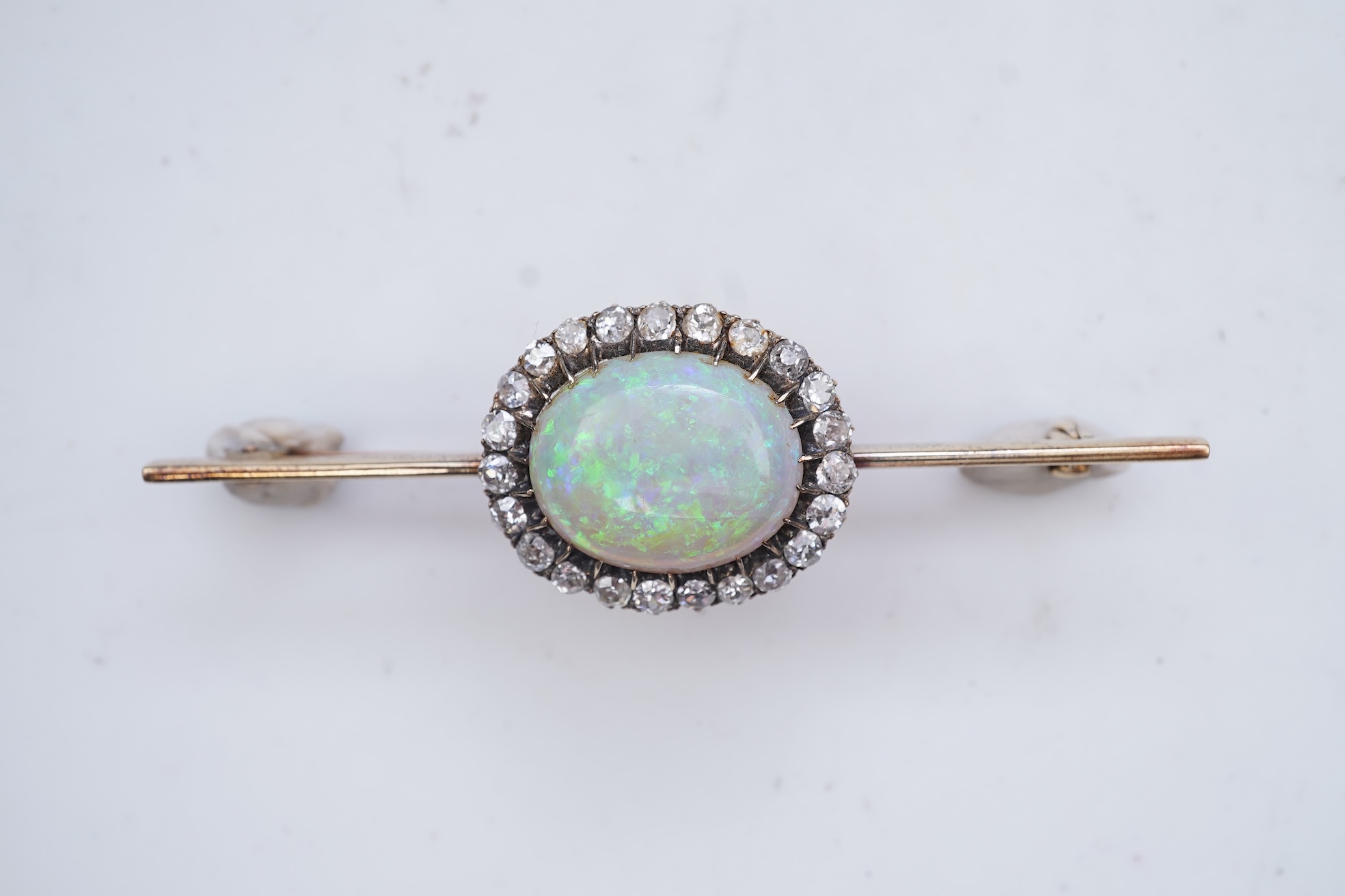 An opal and diamond brooch, circa 1900
